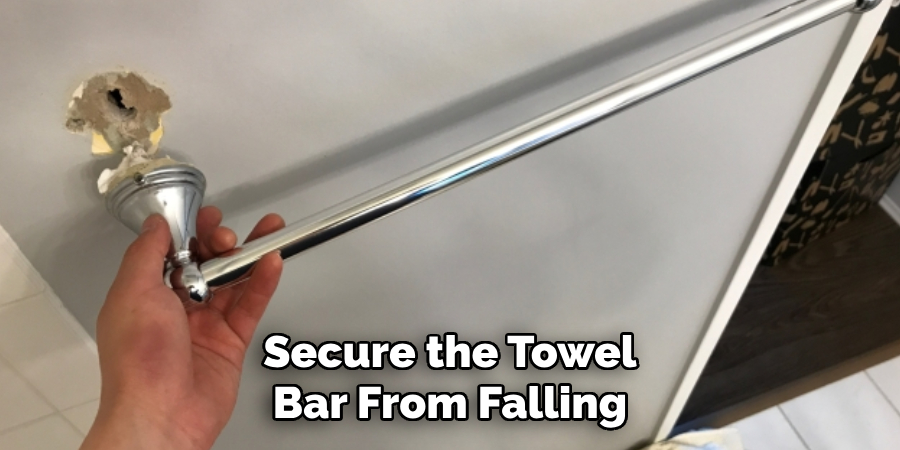 Secure the Towel Bar From Falling