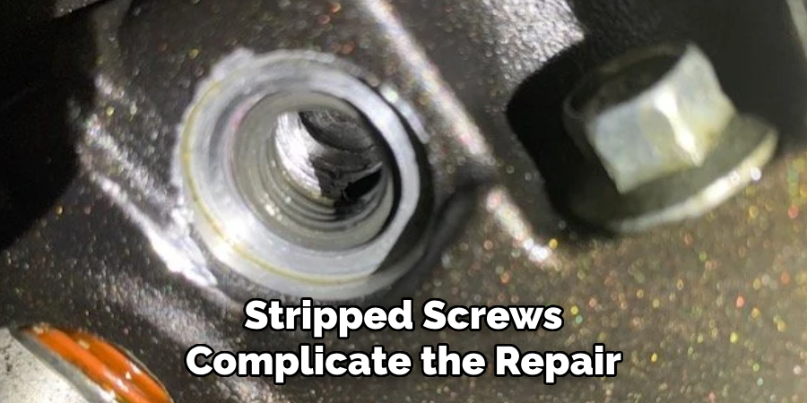 Stripped Screws Complicate the Repair