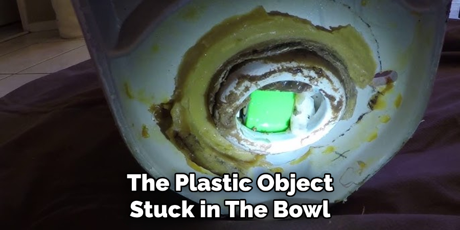 The Plastic Object Stuck in the Bowl