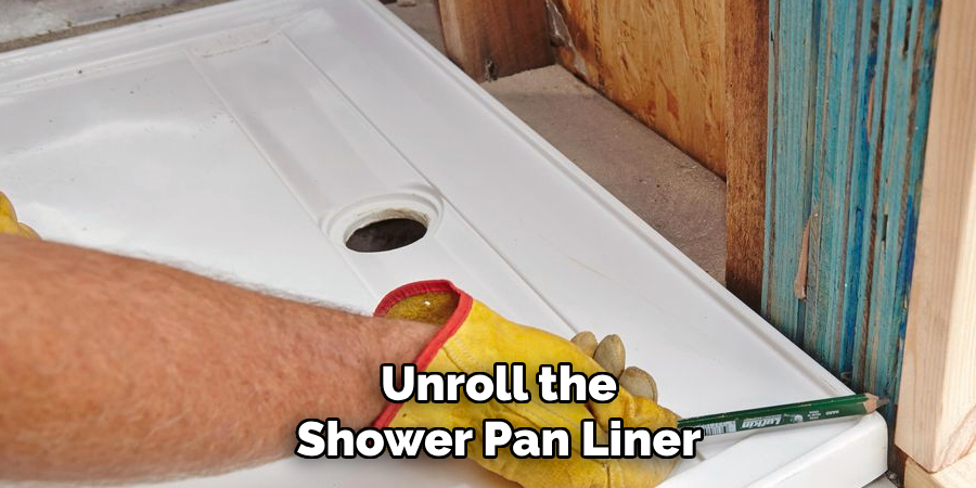 Unroll the Shower Pan Liner