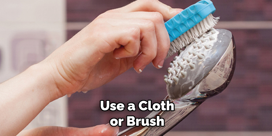 Use a Cloth or Brush