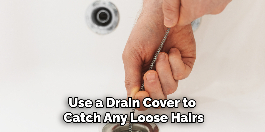 Use a Drain Cover to Catch Any Loose Hairs