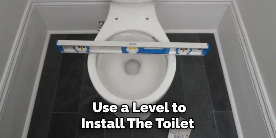 Use a Level to Install the Toilet 