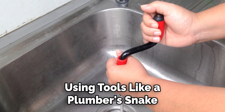 Using Tools Like a Plumber's Snake