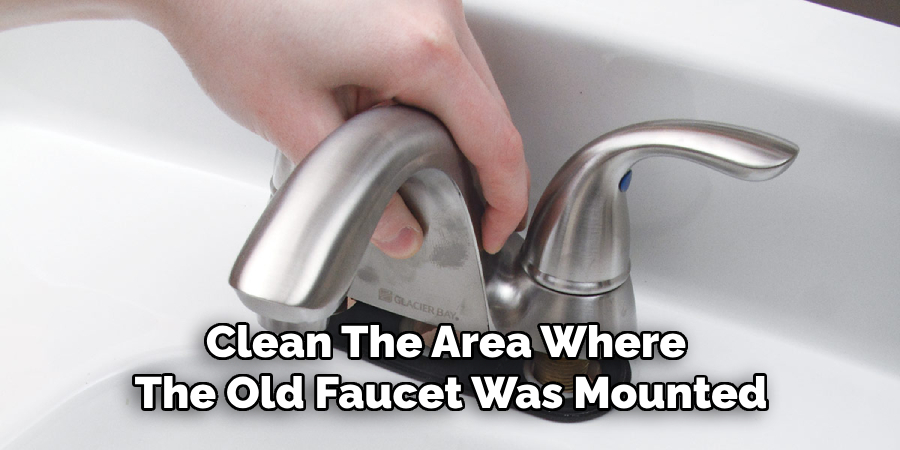 Clean the Area Where the Old Faucet Was Mounted
