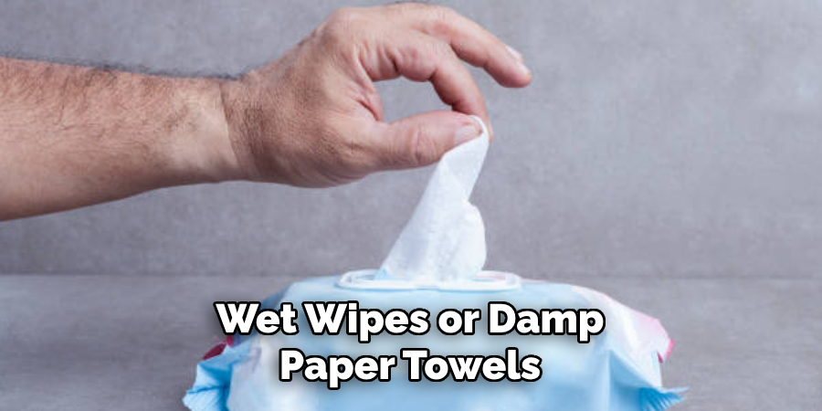 Wet Wipes or Damp Paper Towels