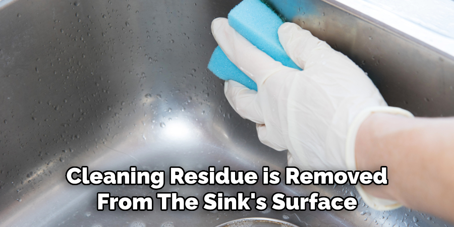 Cleaning Residue is Removed From the Sink's Surface