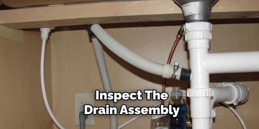 Inspect the Drain Assembly