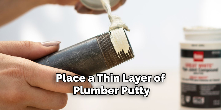 Place a Thin Layer of Plumber Putty