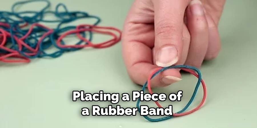 Placing a Piece of a Rubber Band