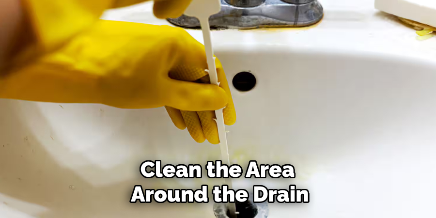 Clean the Area 
Around the Drain