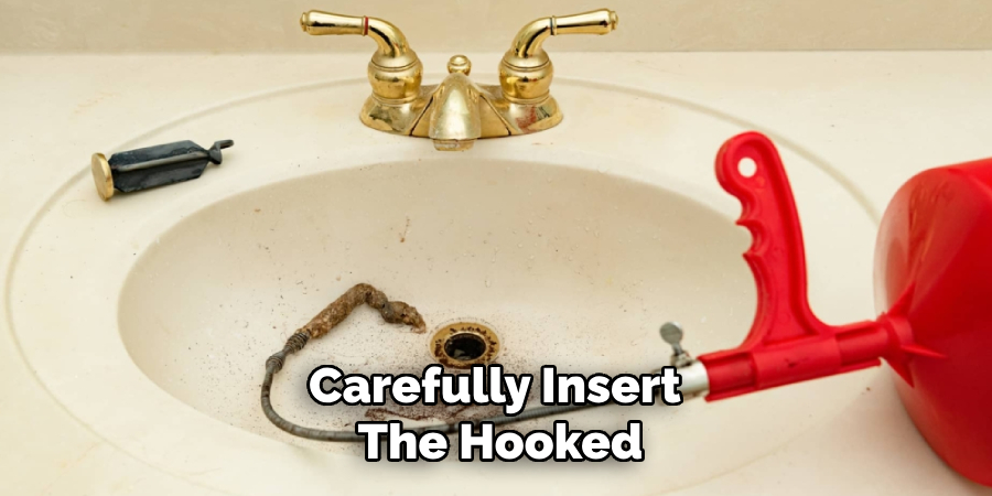 Carefully Insert 
The Hooked