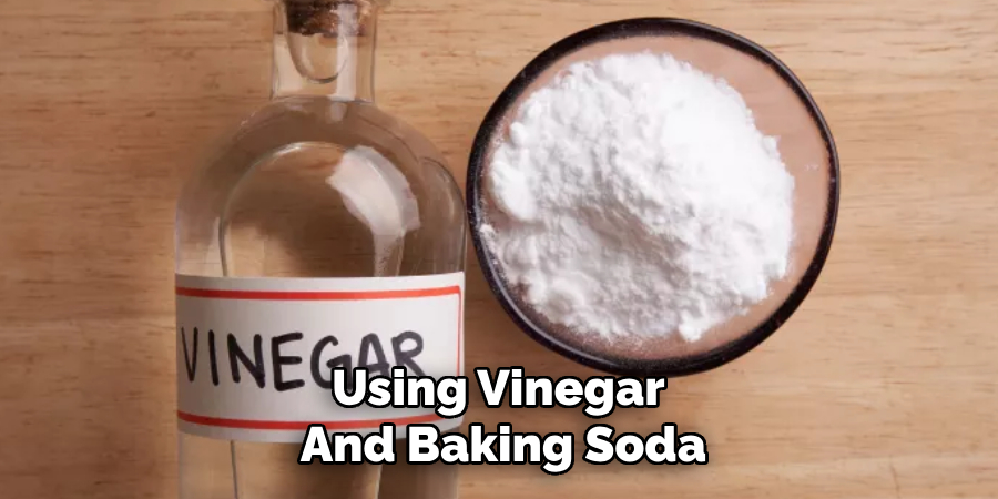 Using Vinegar 
And Baking Soda