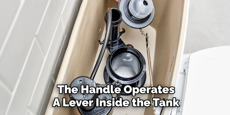 The Handle Operates A Lever Inside the Tank