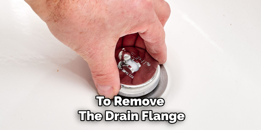 To Remove 
The Drain Flange