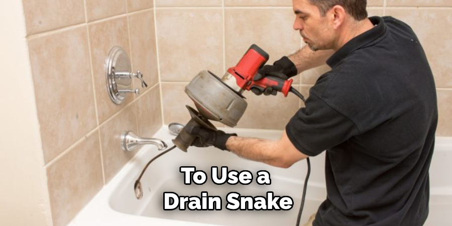 To Use a 
Drain Snake