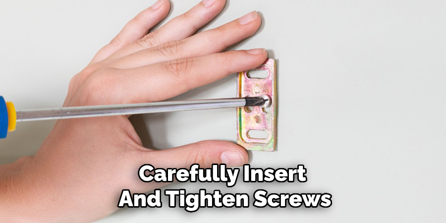 Carefully Insert and Tighten Screws