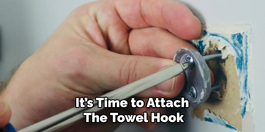 It’s Time to Attach the Towel Hook