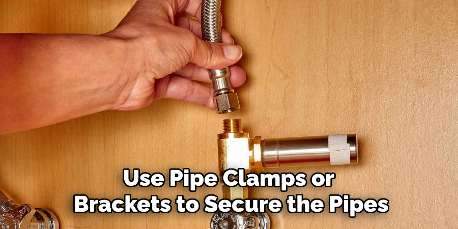 Use Pipe Clamps or Brackets to Secure the Pipes