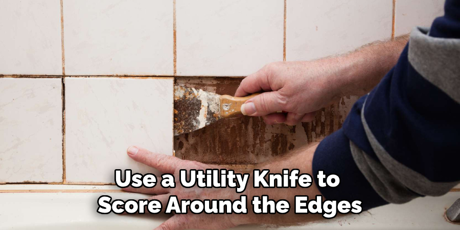 Use a Utility Knife to Score Around the Edges