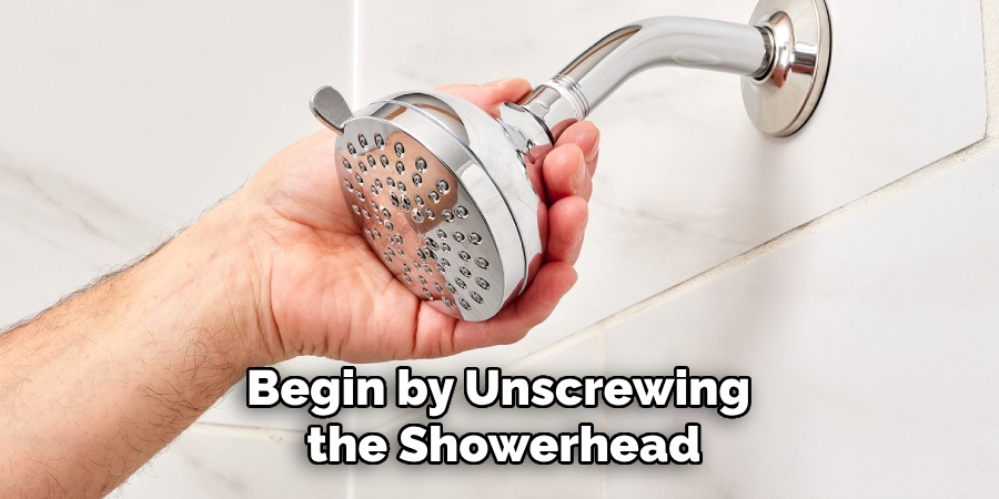 Begin by Unscrewing the Showerhead