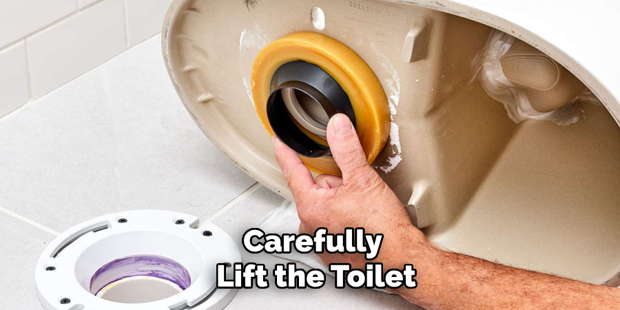 Carefully Lift the Toilet