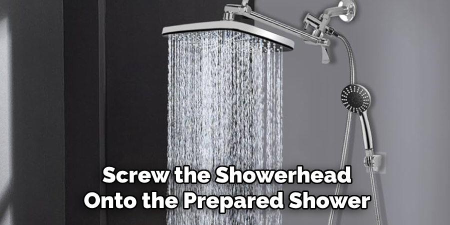 Screw the Showerhead Onto the Prepared Shower