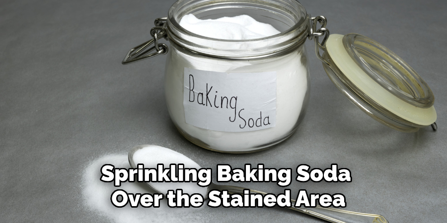 Sprinkling Baking Soda Over the Stained Area