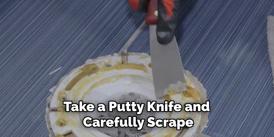 Take a Putty Knife and Carefully Scrape