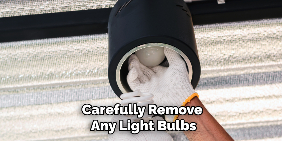 Carefully Remove
 Any Light Bulbs