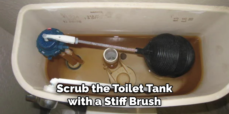 Scrub the Toilet Tank with a Stiff Brush