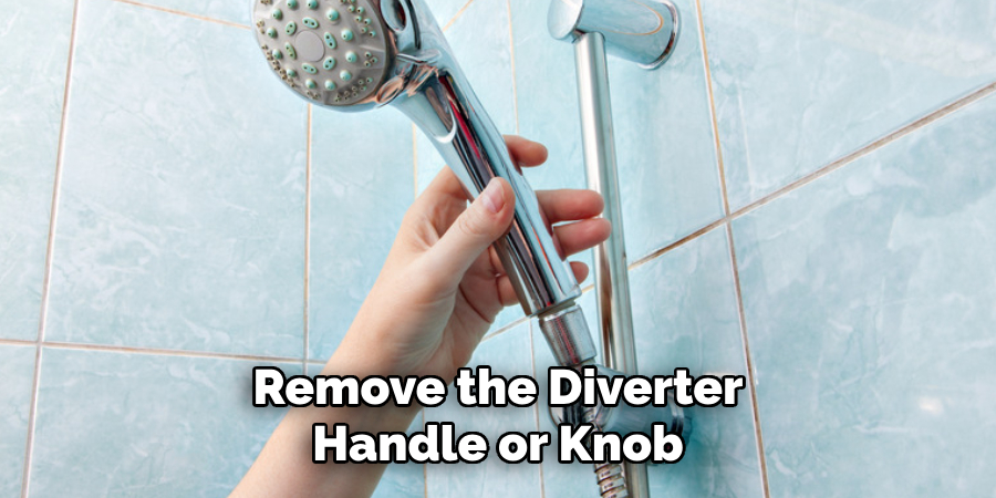 remove the diverter handle or knob