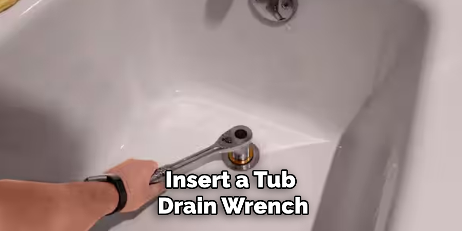 Insert a Tub 
Drain Wrench