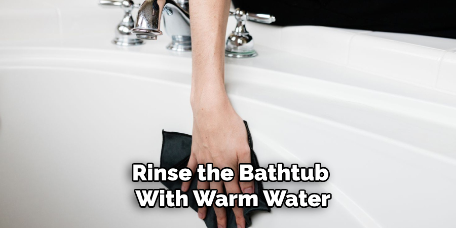 Rinse the Bathtub 
With Warm Water