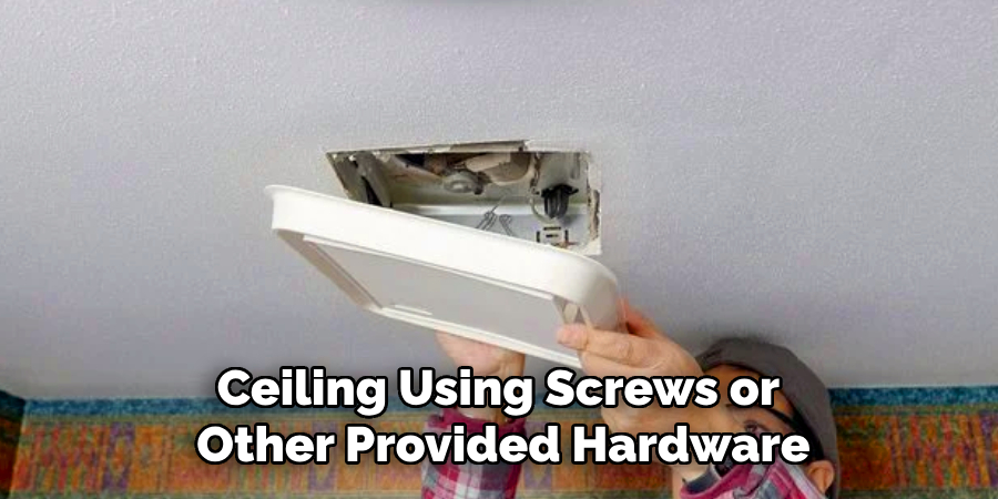 Ceiling Using Screws or
Other Provided Hardware