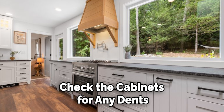 Check the Cabinets 
for Any Dents