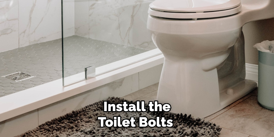  Install the 
Toilet Bolts 