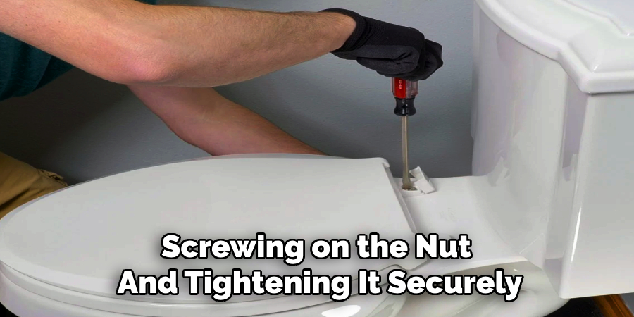 Screwing on the Nut
And Tightening It Securely