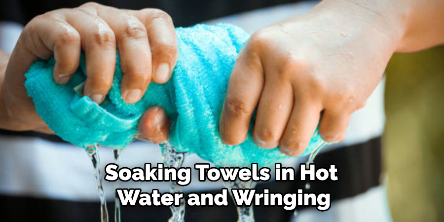 Soaking Towels in Hot
Water and Wringing
