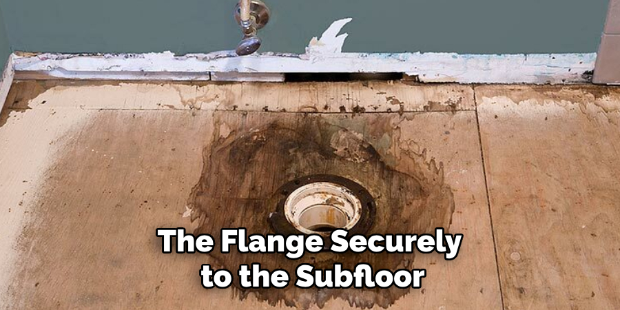 The Flange Securely
to the Subfloor
