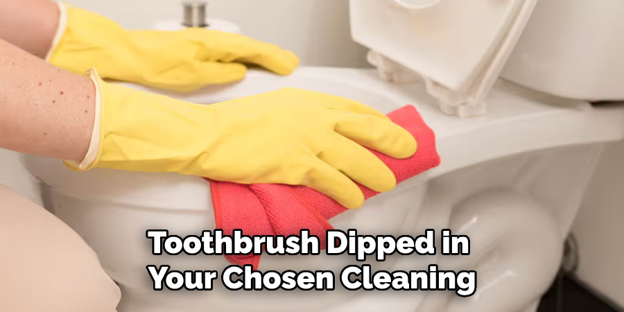 Toothbrush Dipped in
Your Chosen Cleaning