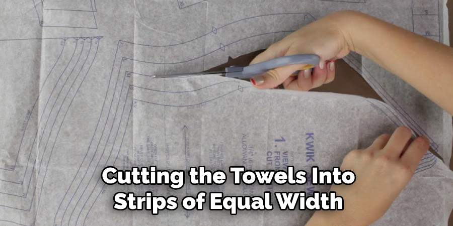 Cutting the Towels Into
Strips of Equal Width