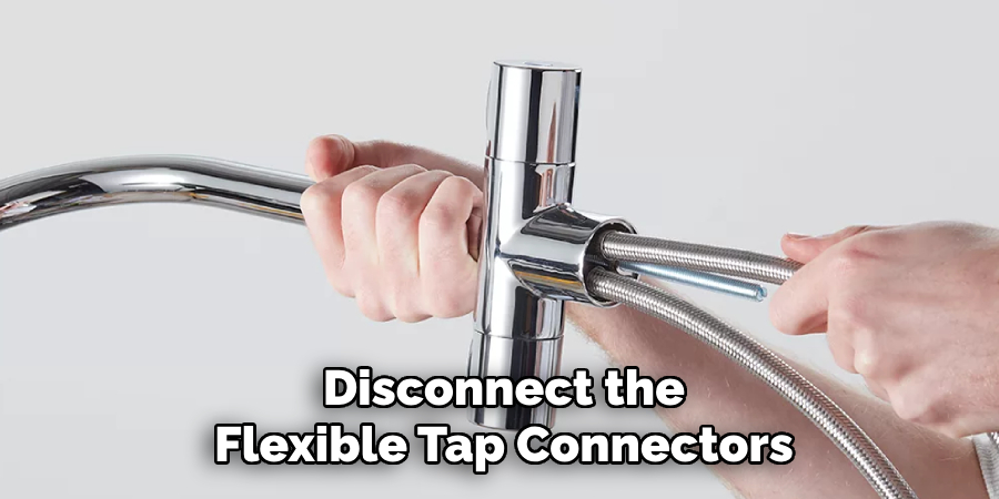 Disconnect the
Flexible Tap Connectors