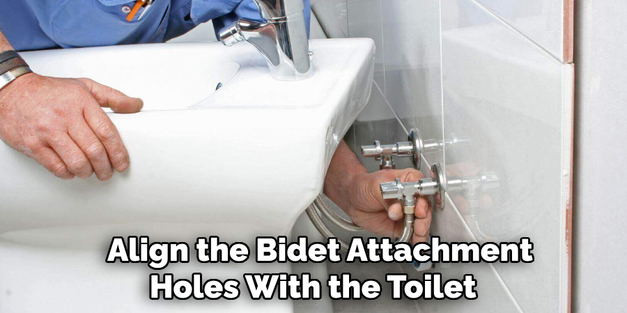 Align the Bidet Attachment 
Holes With the Toilet   