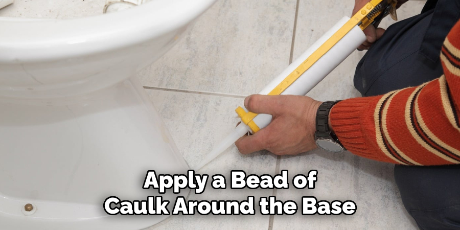 Apply a Bead of Caulk Around the Base