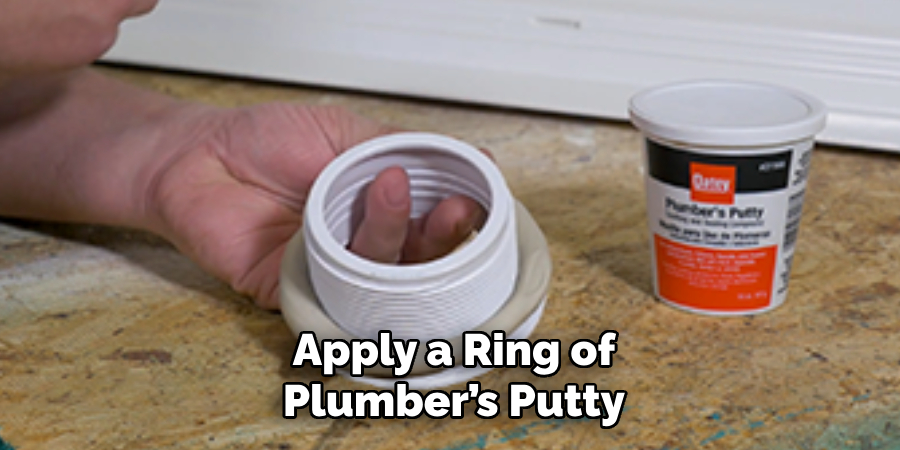 Apply a Ring of Plumber’s Putty