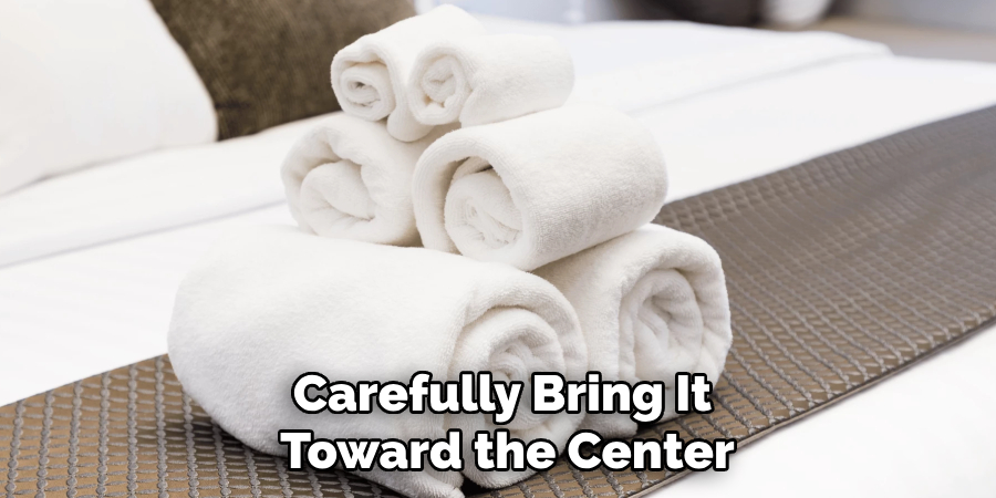 Carefully Bring It
 Toward the Center