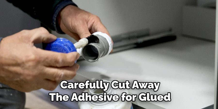 Carefully Cut Away
The Adhesive for Glued