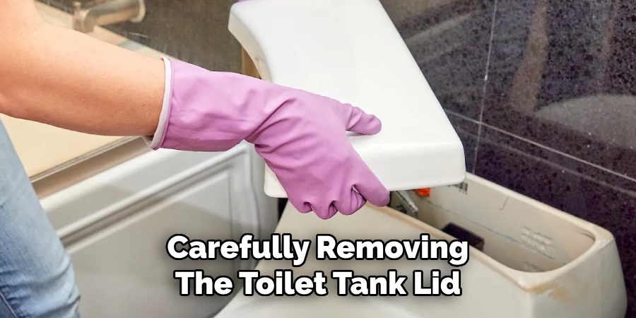 Carefully Removing
The Toilet Tank Lid
