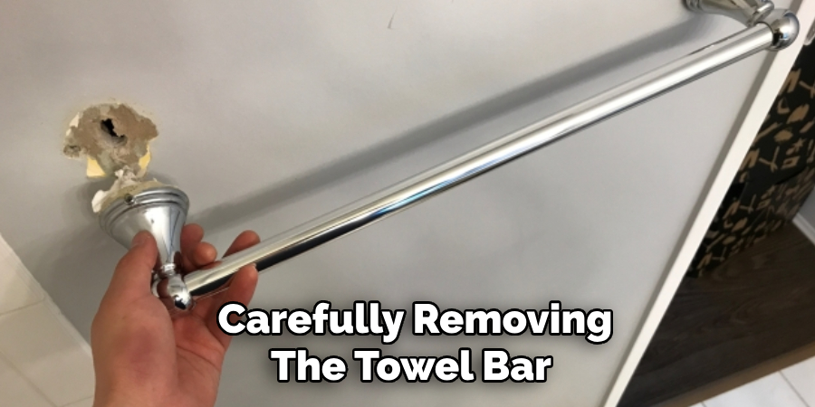 Carefully Removing
The Towel Bar 